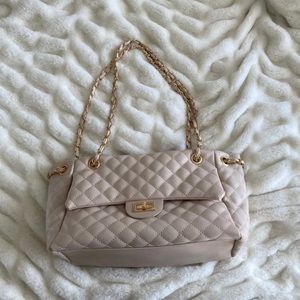 Quilted bag with chain straps